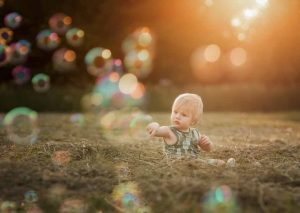 baby-in-field-bubbles